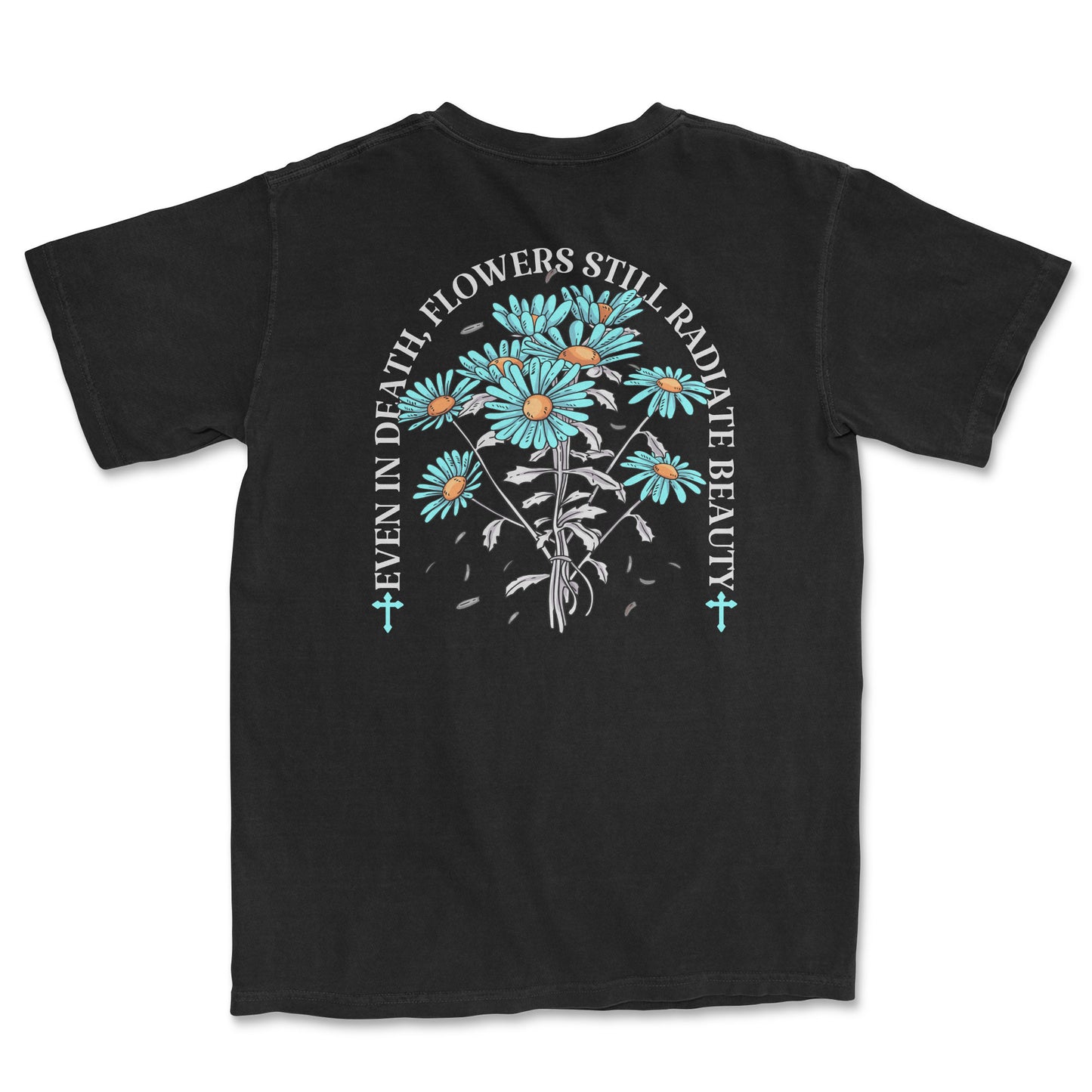 Image of a black t-shirt with a flower design and the quote " Even in death flowers still radiate beauty".